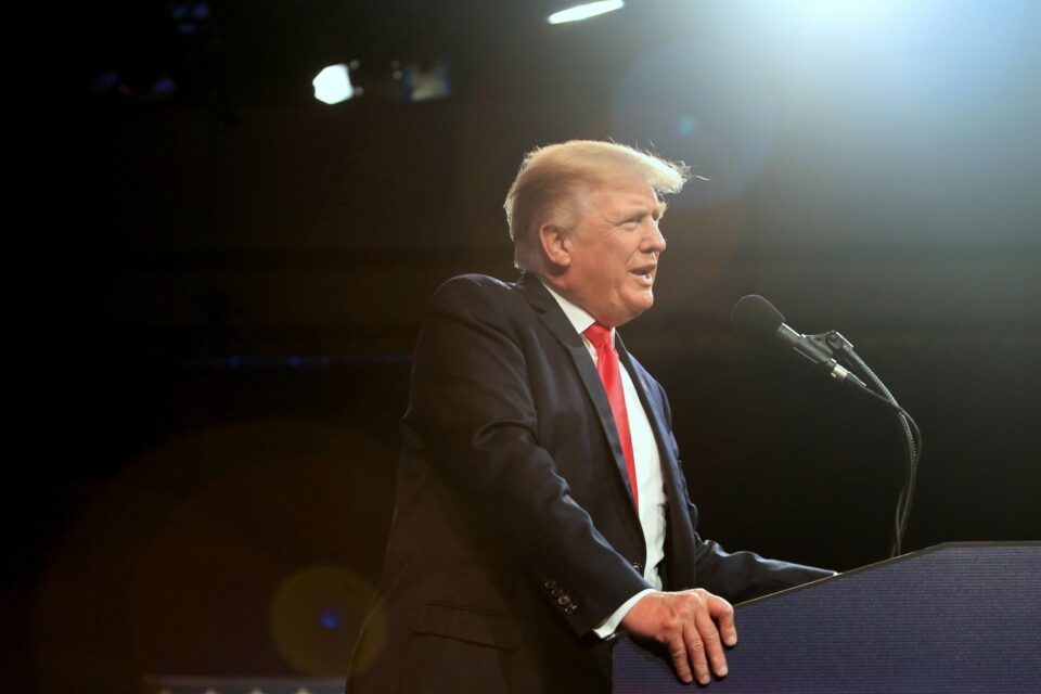 Trump met with boos after saying he got Covid booster