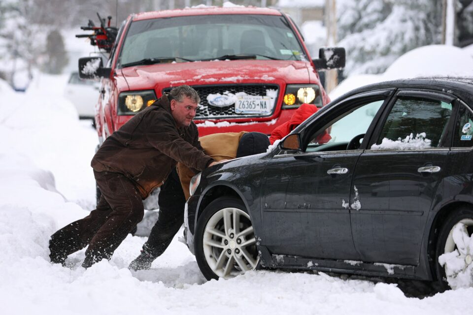 Heavy snow buried Buffalo, New York, in nearly 4 feet, leaving some people stuck in their cars for more than two days