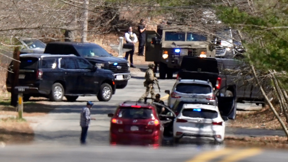 The Massachusetts Air National Guard member is in custody after classified material was posted online